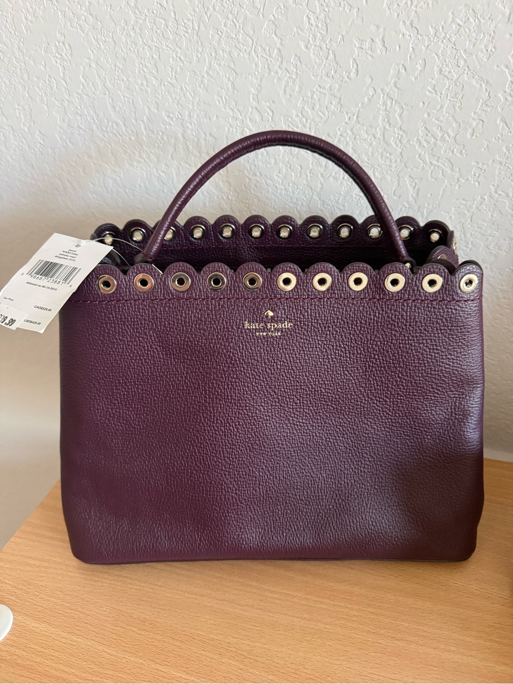 kate spade Janell in Deep Plum Grommet Top-Handle Satchel